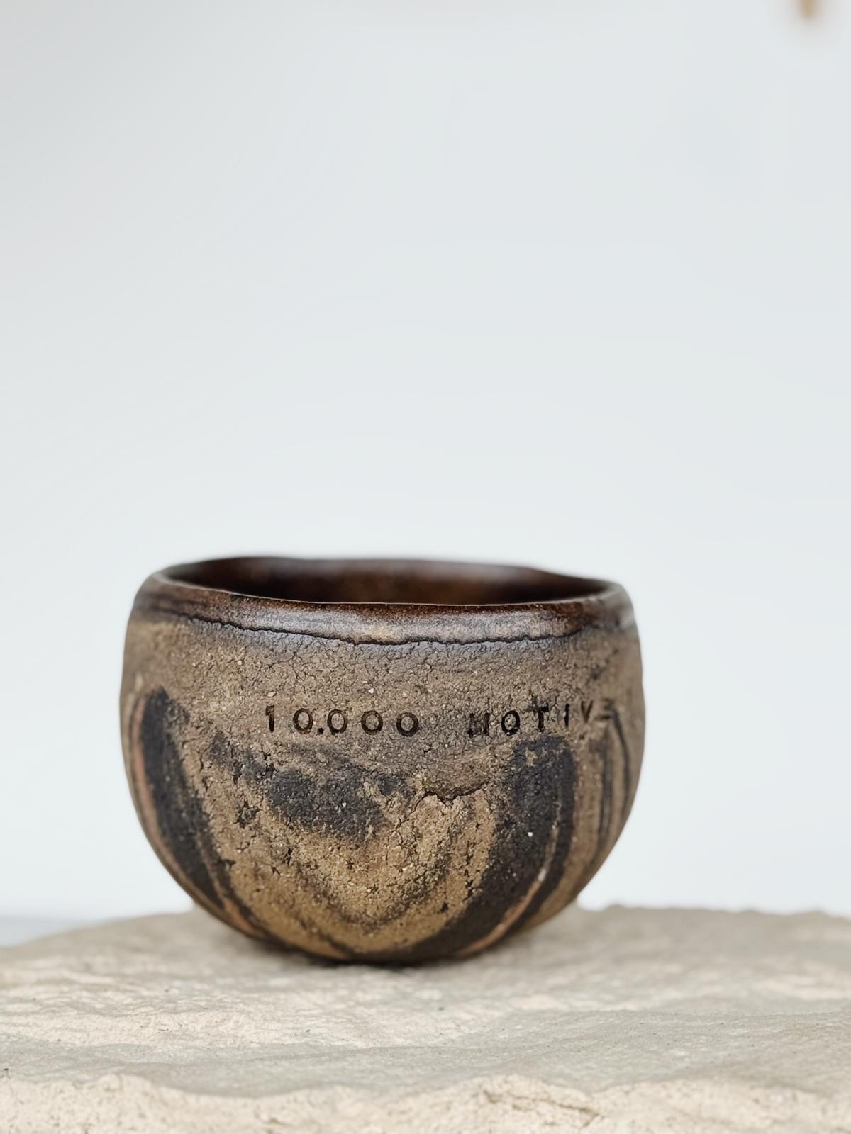 Rooted - 10.000 Motive (Unique)